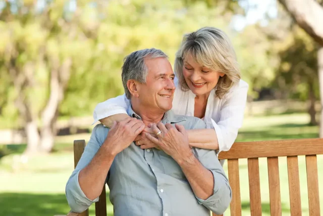 Older couple enjoying retirement thanks to smart financial planning after a career in medicine.