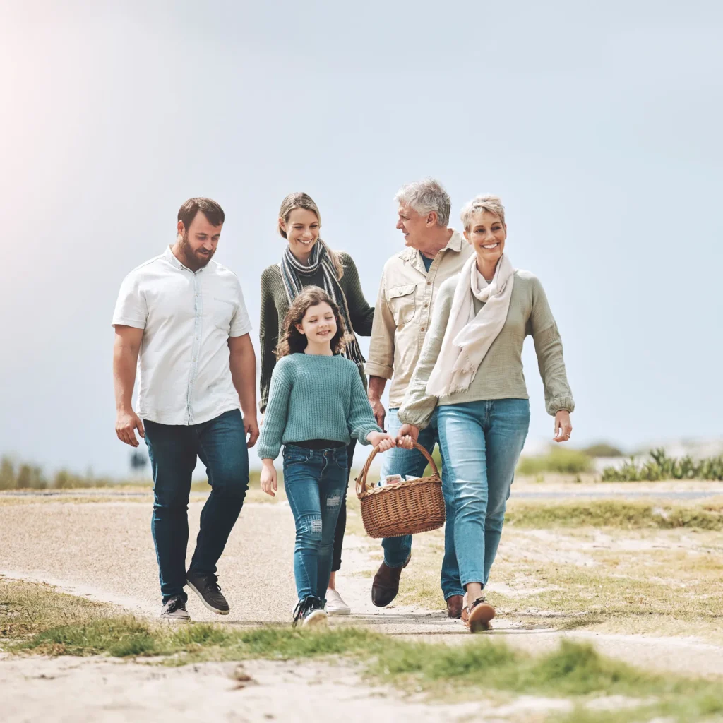 family-walking-hilltop