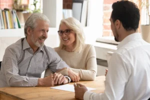 Financial advisor discussing retirement tax strategies with a couple planning retirement income