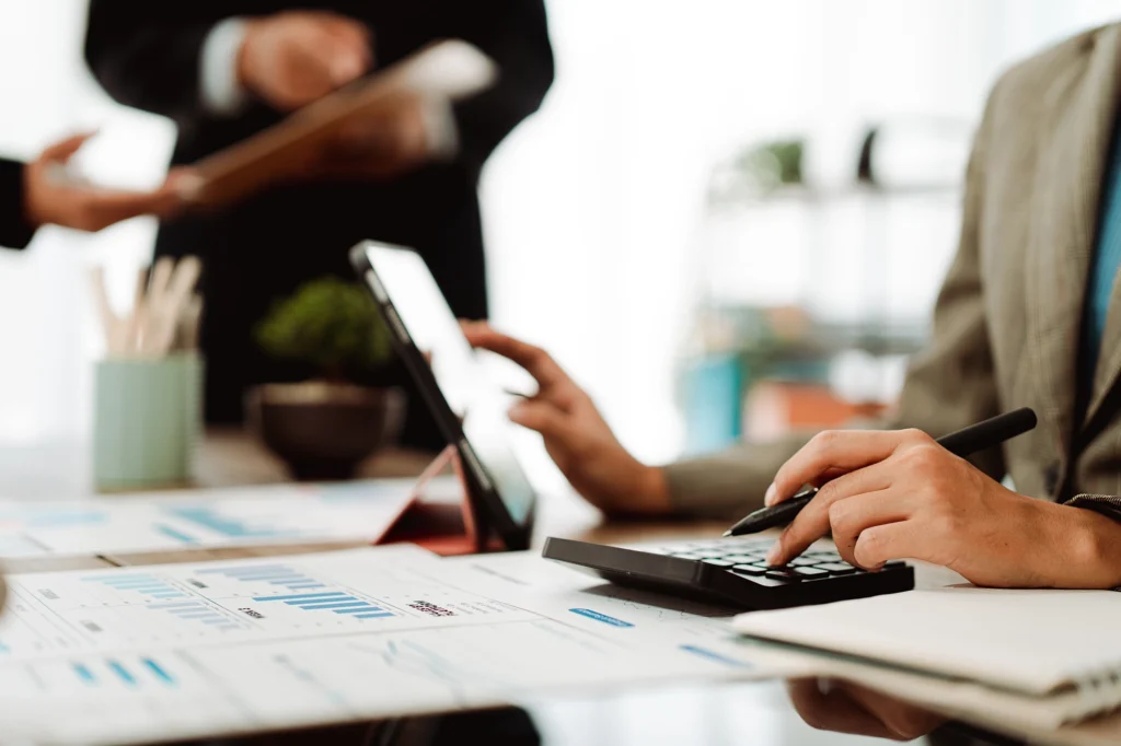 Bookkeeper organizing financial records and bookkeeping services for a growing small business